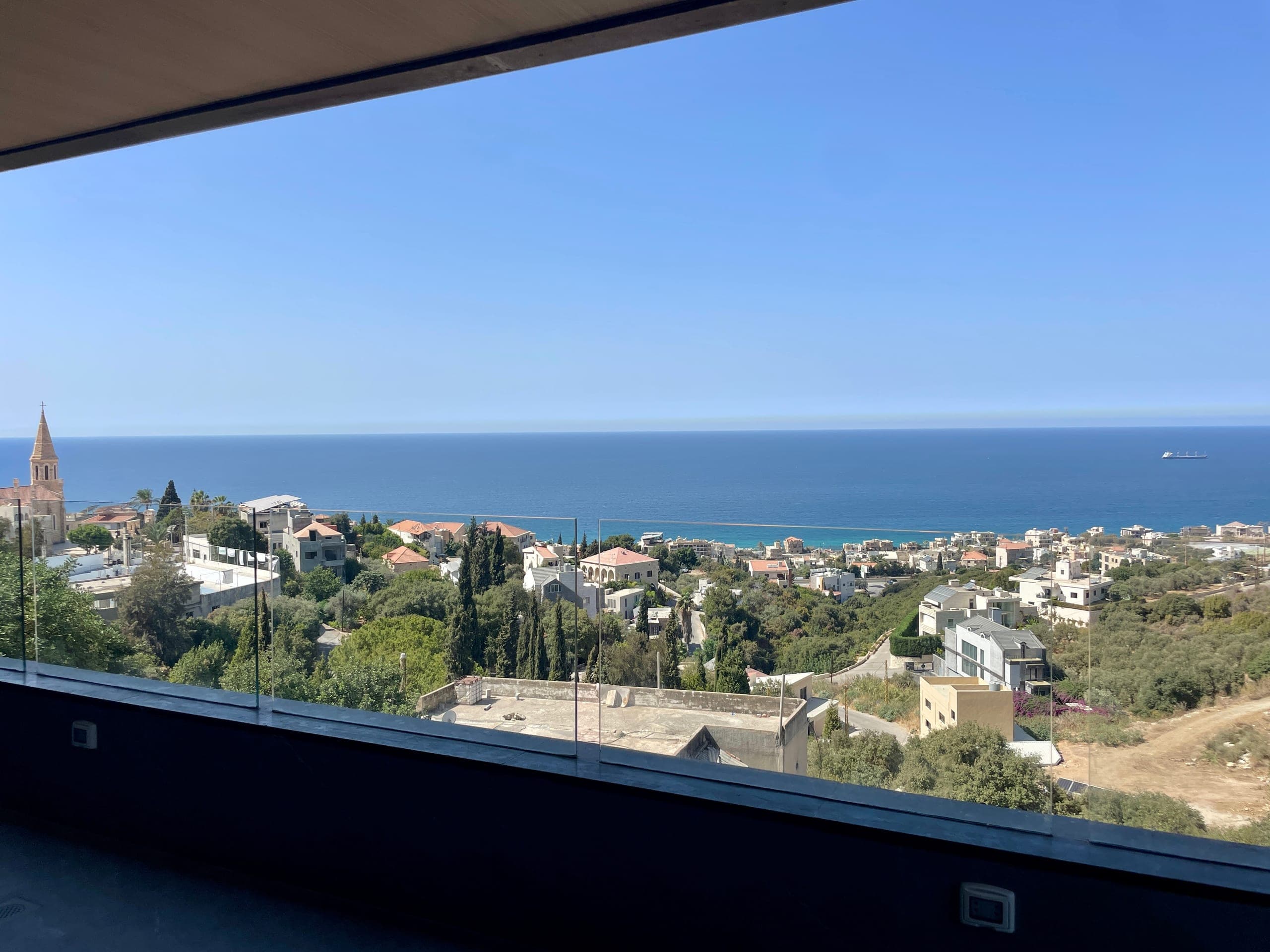 The Batroun coast from a balcony at Kfaraabida